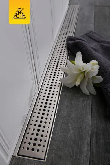 Rigola de interior montate la perete MCH cu rama si gratar de inox BASIC lucioasa, 650 mm